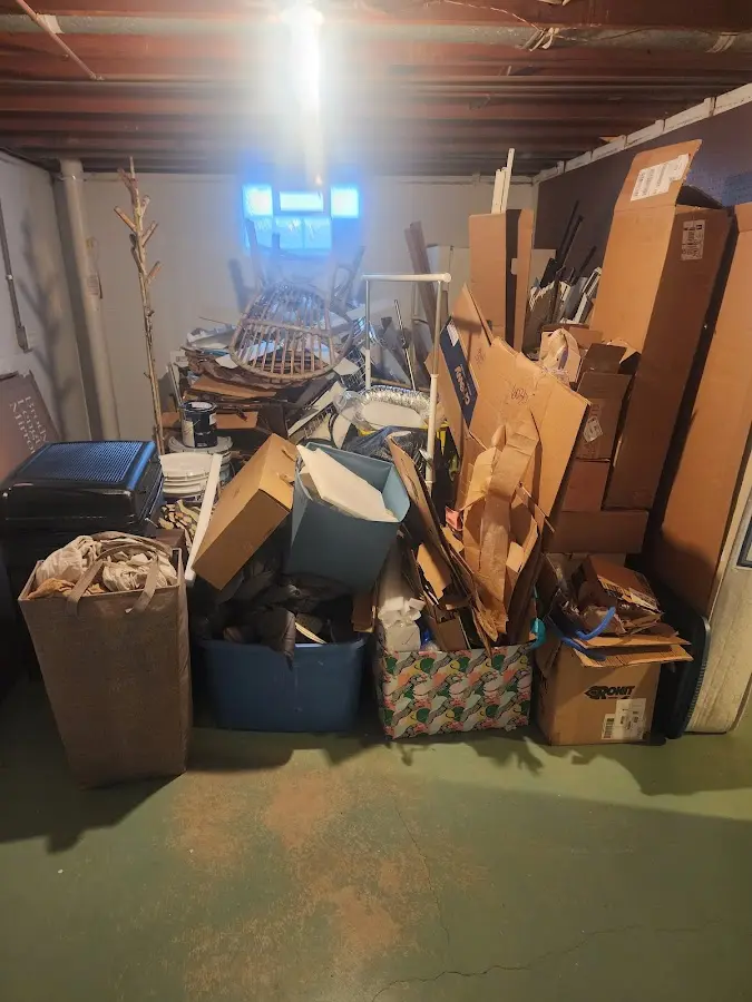 Roll-off dumpster container at job site for Construction Dumpster Rental in River Road